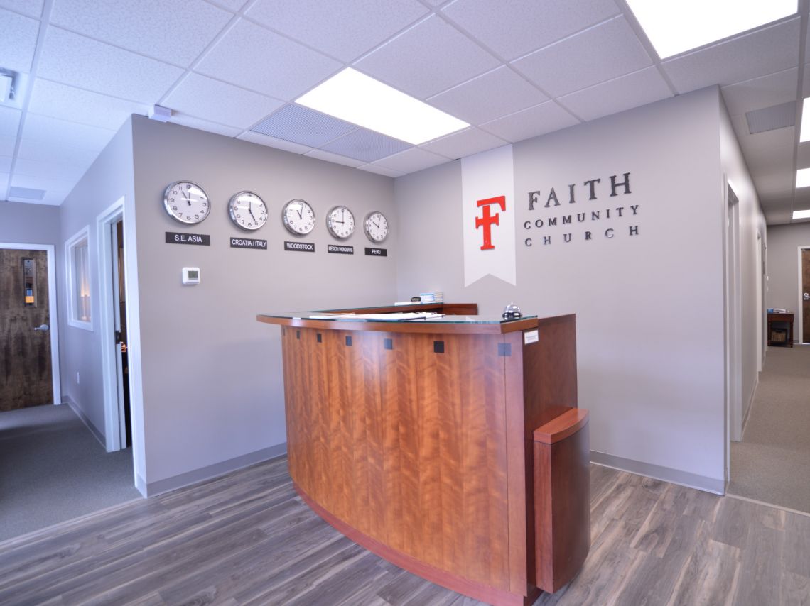 Faith Community Church Reception Area with clocks on the walls
