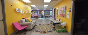 Core Community School Classroom, bright yellow hallway